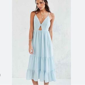 Midi dress, light blue with crossed straps and small cut out